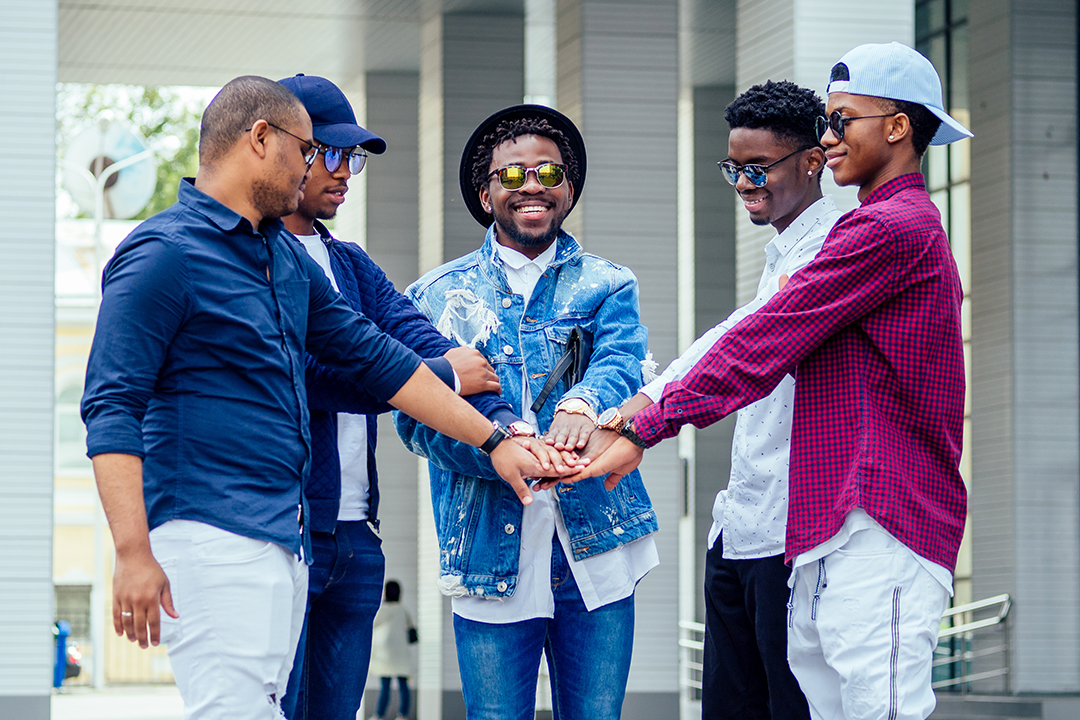 Group of many friends laughing out loud outdoor, sharing good and positive mood.