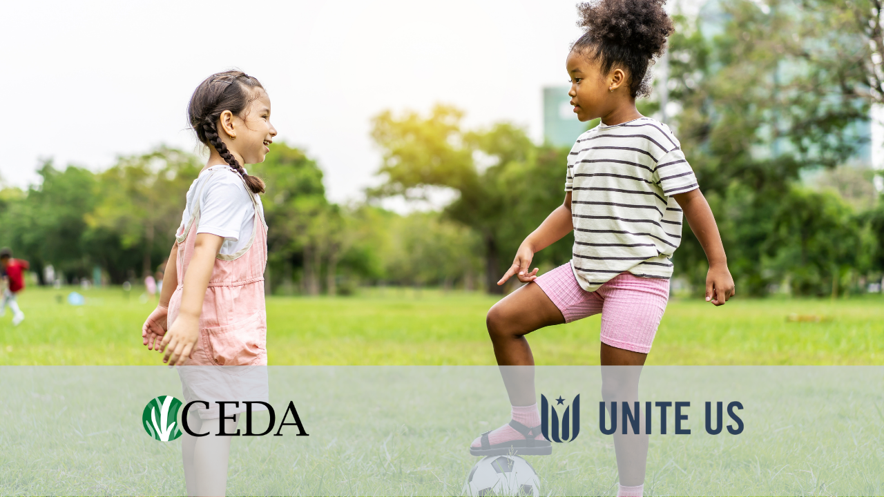 Image of young girls playing soccer